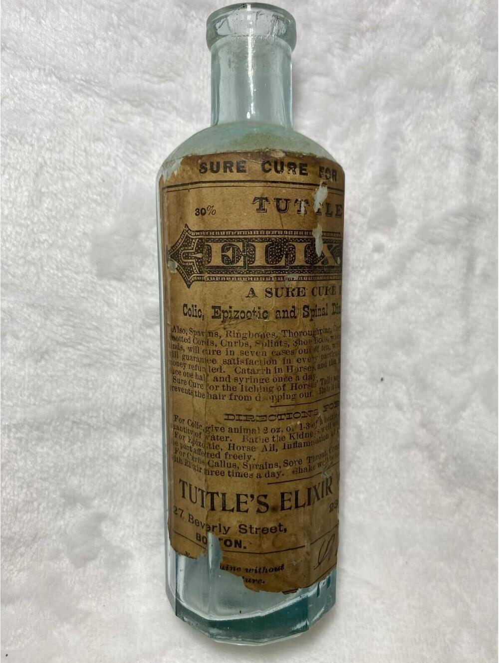 Tuttle’s Elixir Cure Aqua Glass Medicine Bottle with‎ Paper Label, Labeled